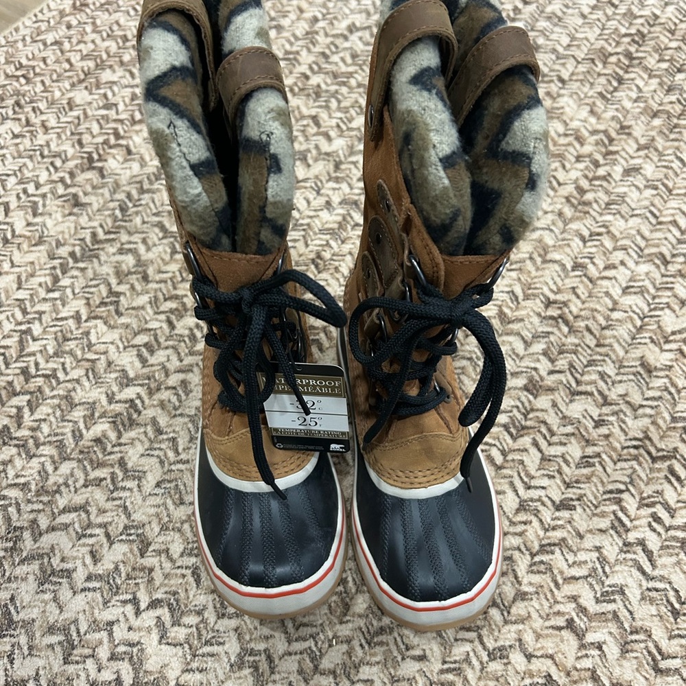 Sorel Tan and Black Snow Boots